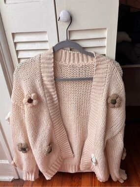 Cozy Cream Knit Cardigan Sweater with Flower Embellishments